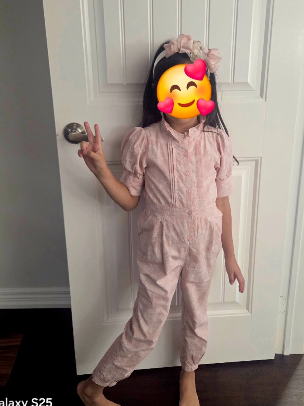 Floral pink cotton jumpsuit for girls.